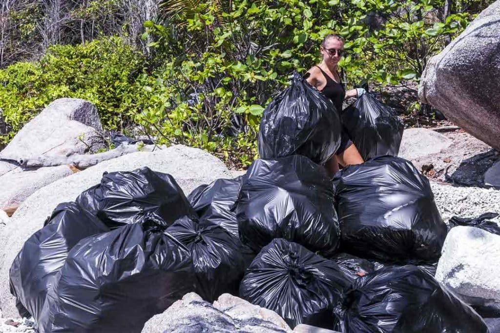 Bin Bags Stacking up on the beach ready for transfer to the boat