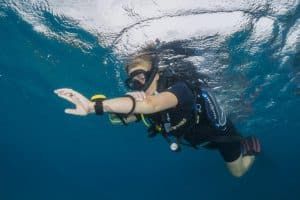 diver doing navigation skills on the surface