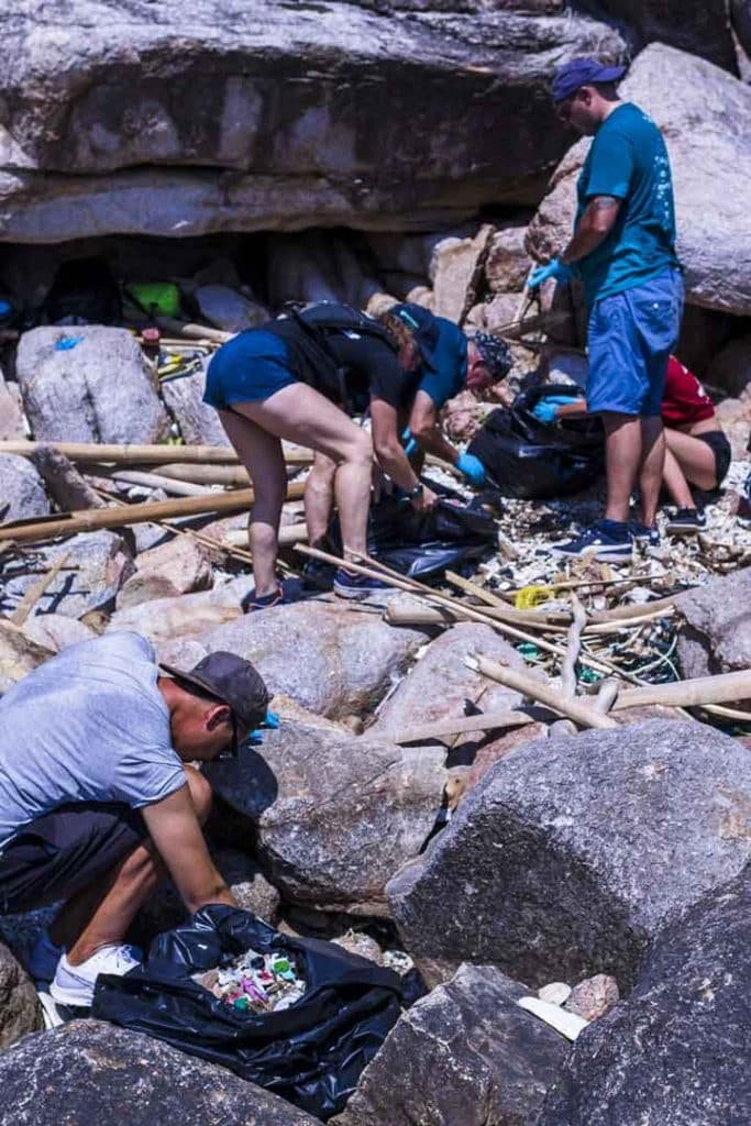 Sorting through the rubbish on the beach